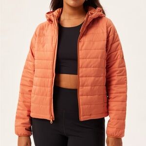 Girlfriend Collective Hooded Packable Puffer in Wild Ginger
